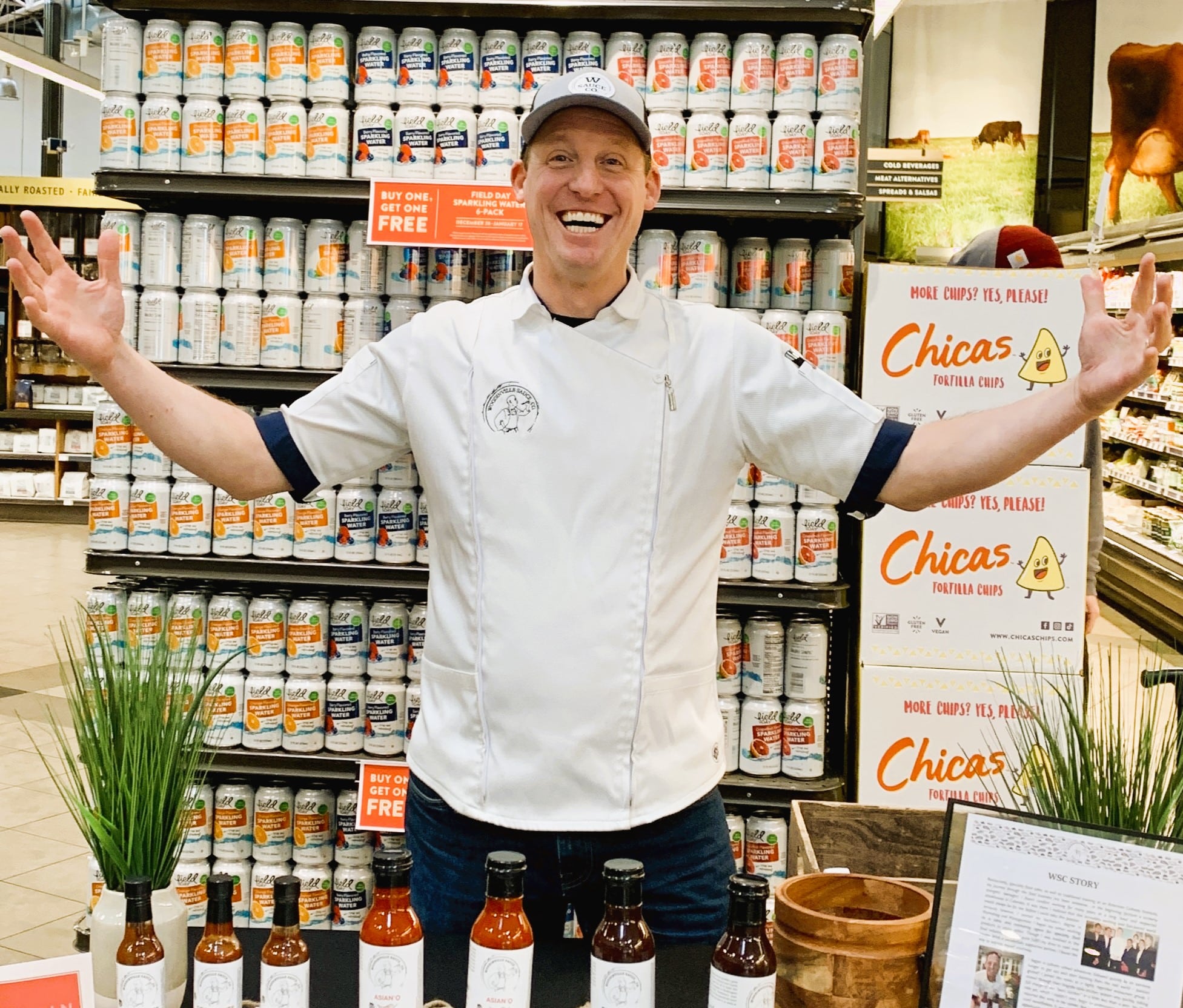 Dave Holthus, owner of Woodinville Sauce Co at PCC in-store display